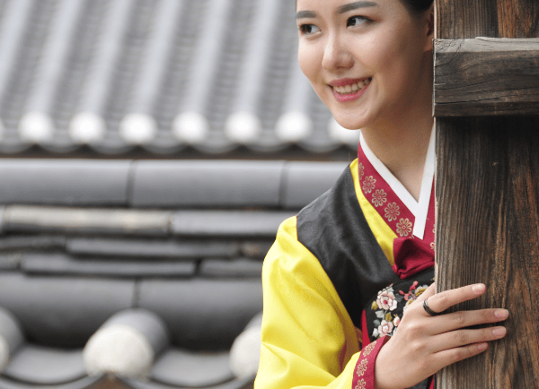 girl standing and smiling 