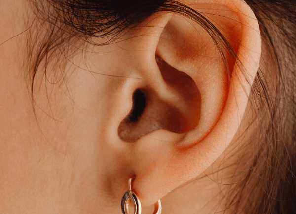 a girl ear wih earring