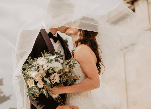 bride and groom kissing
