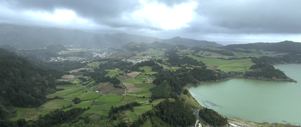 a view of a lake and mountains in the distance