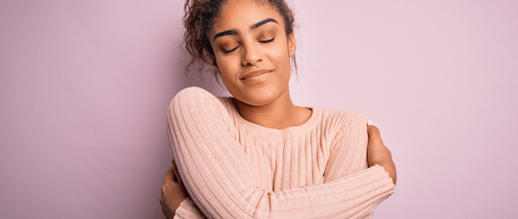 a woman with her eyes closed and her eyes closed