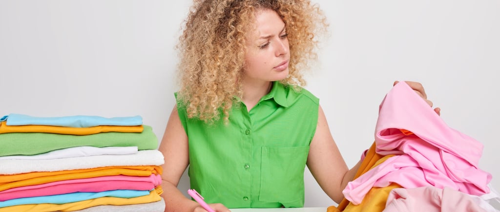 a woman is sitting at a table with a notebook and trying to see the labels