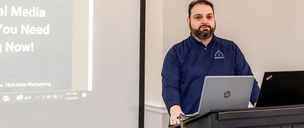 BJ Corey, 13th Mile Marketing CEO, presenting at the Walpole Business Forum.
