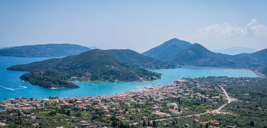 Panoramic view of Nidri a bay with boats in the water