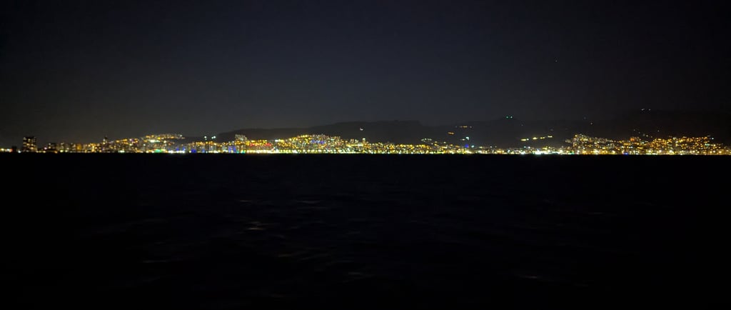 night view of Izmir, Turkeys costline from a ferry 
