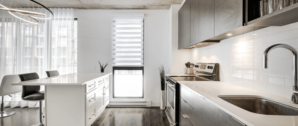 a kitchen with a sink and a counter top