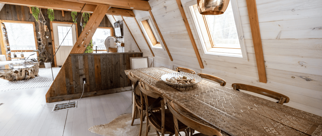 a wooden table with a wooden table and chairs