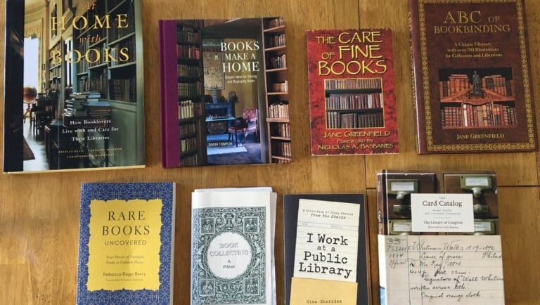 a collection of books and bookshelves on a table
