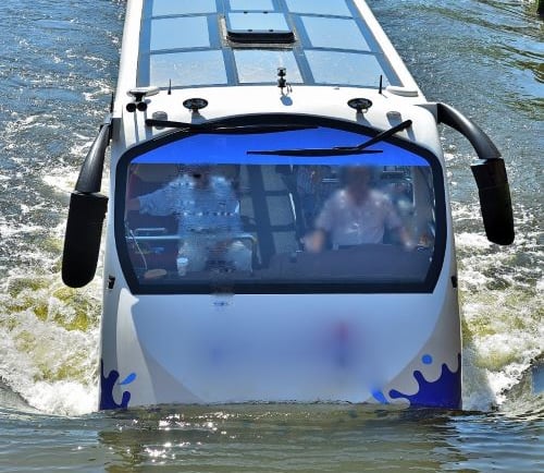 a bus that is sitting in the water