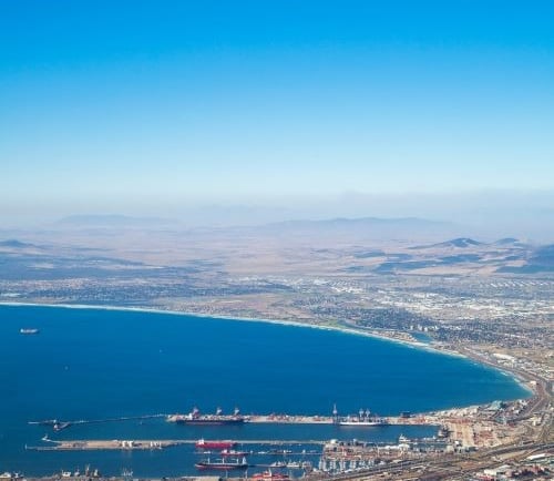 a view of a cape town city with a large body of water