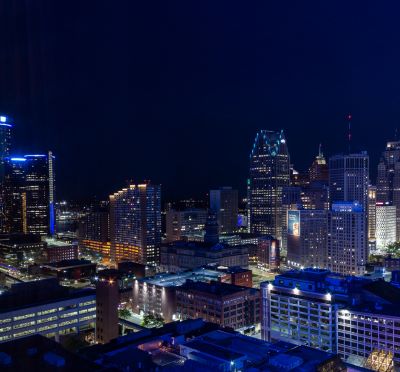 Detroit - a city skyline at night time with a view of the city