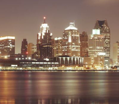 Detroit - a city skyline with a view of a city at night
