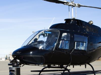 a helicopter that is sitting on a tarmac