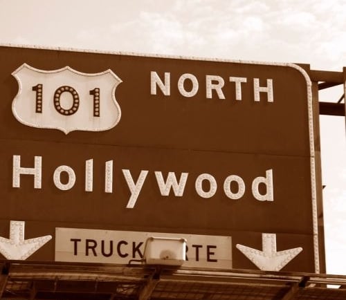 a highway sign for the 101th Hollywood street sign