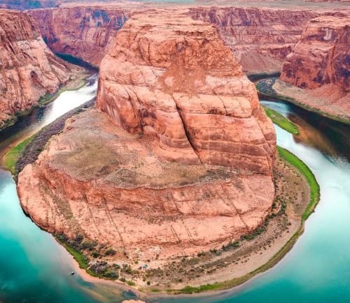 a river running through a canyon in the grand canyon