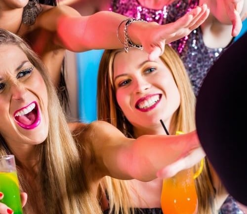 a group of friends having fun time at a party