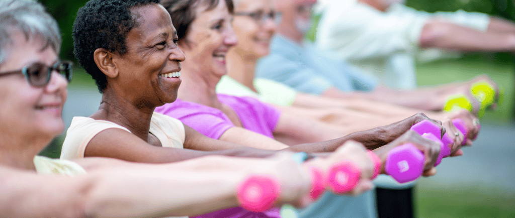 a group of people holding dumb dumbs and dumbs