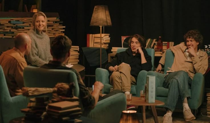 Photo of a group of people talking about books