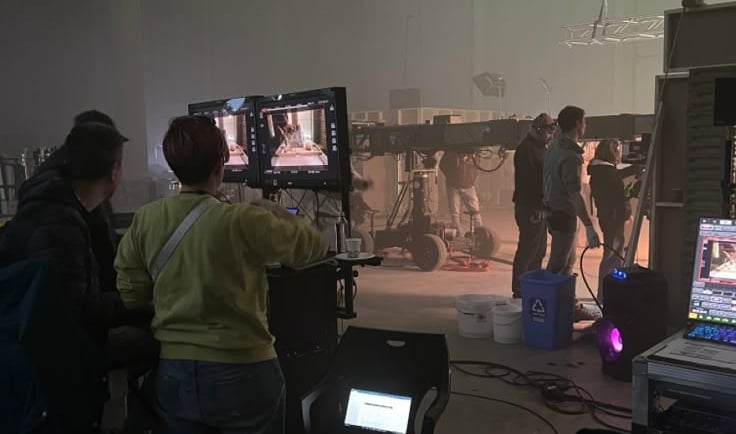 A group of people in a film studio shooting a movie