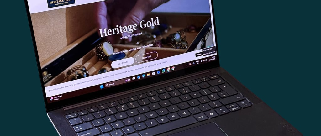 Heritage Gold website shown on a laptop