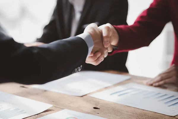 investors shaking hands