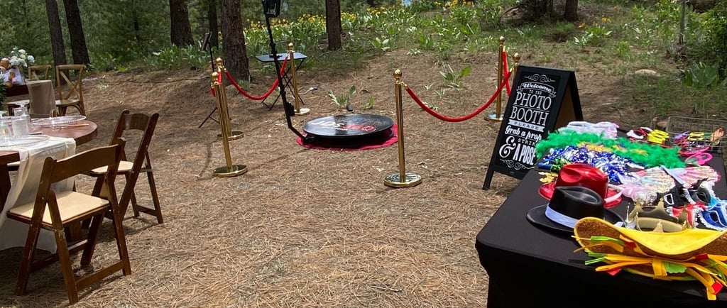 a 360 booth with a table set up for a party