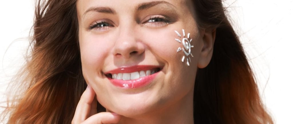 a woman with a white face paint on her face