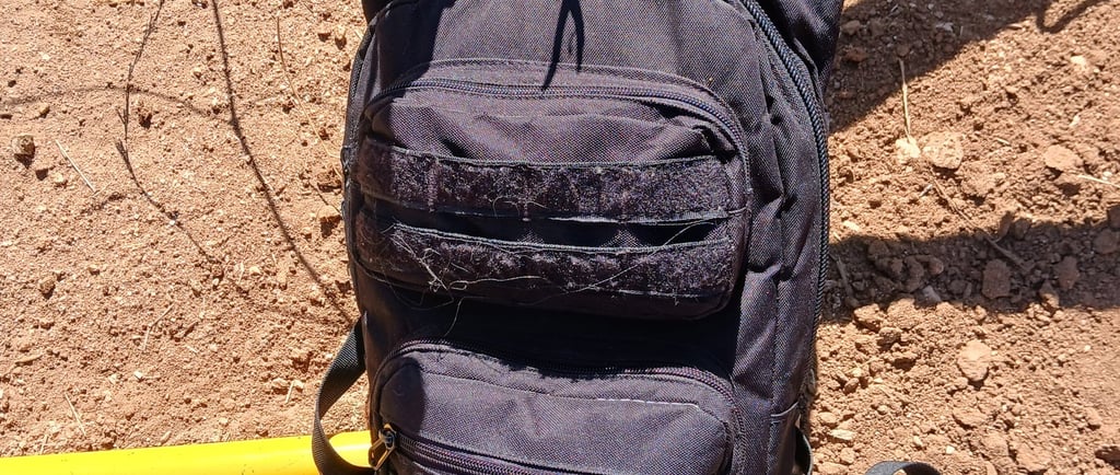 tactical backpack being used for mountain biking