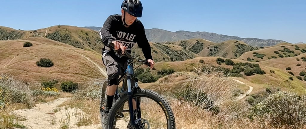 a mtb rider thinking about the jump they are about to hit