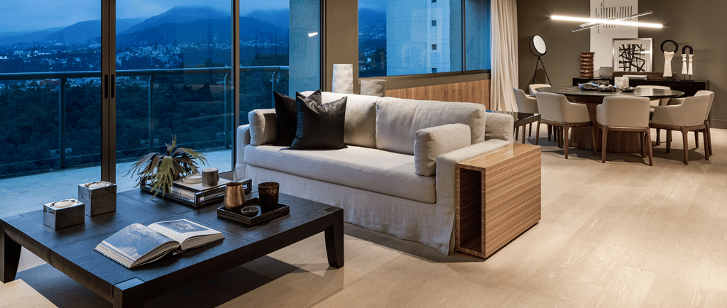 a living room with a couch and a table