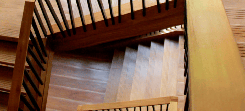 a staircase case with a wooden staircase case