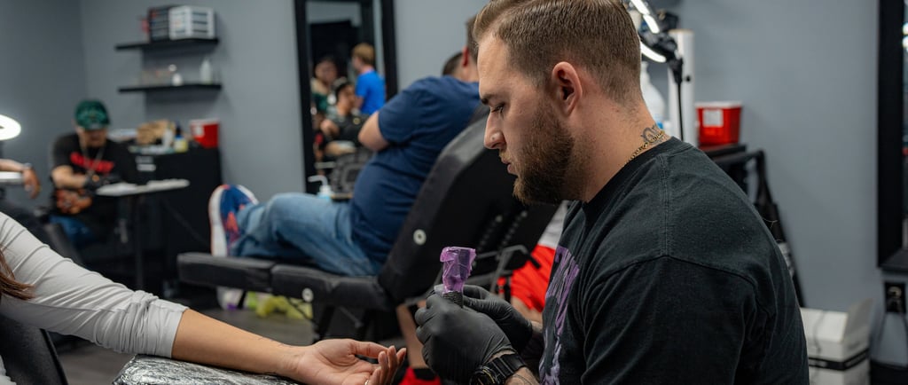 Tattoo session in progress at Aura Tattoo Studios, a top-rated Lewisville tattoo shop
