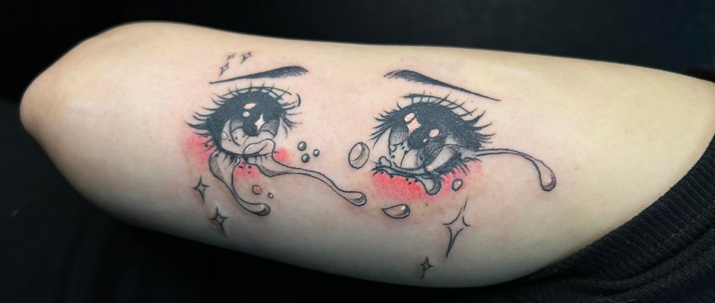 Detailed anime-style tattoo inspired by Japanese animation at Lewisville's Aura Tattoo Studios