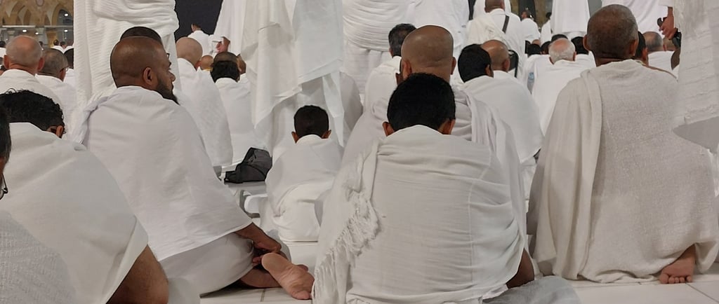 People offering prayer in front of Kaaba in Masjid Al-haram