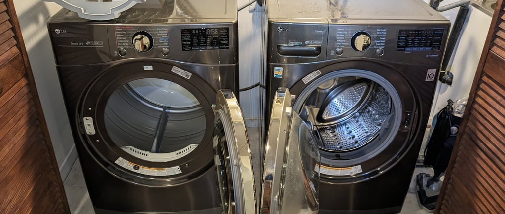 LG Dryer on the left, LG washer on the right both doors are open