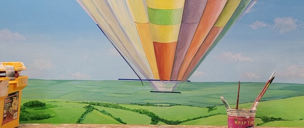 work setup in front of bespoke mural by artworks by marcine in warren, nj