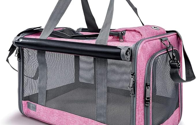 pink and black soft-sided pet carrier