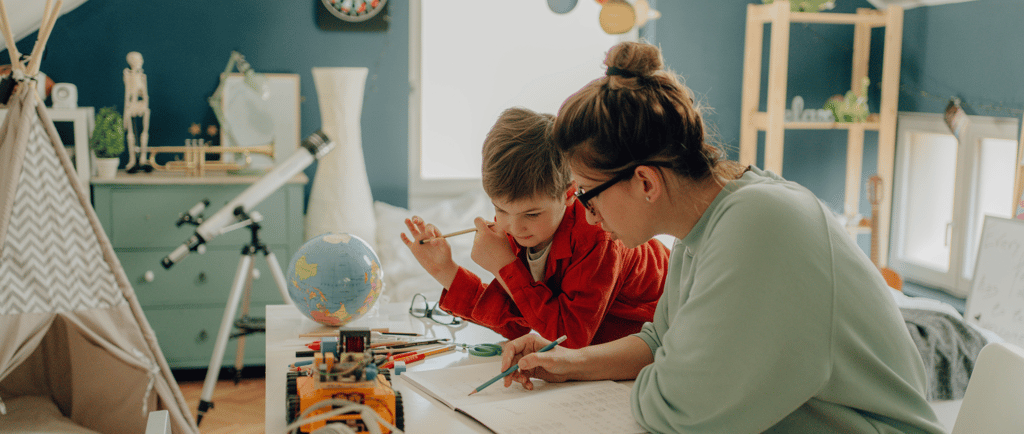 Mom helping child with homeschooling