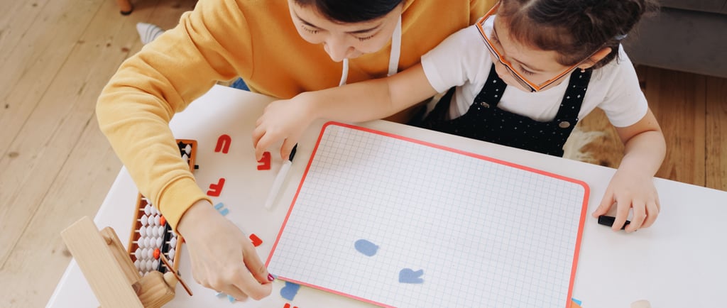 mother and daughter working on homeschool project together