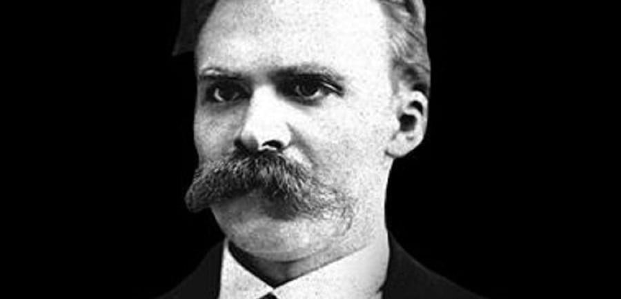 A black and white potrait of German writer Neitzsche with his glories moustache.