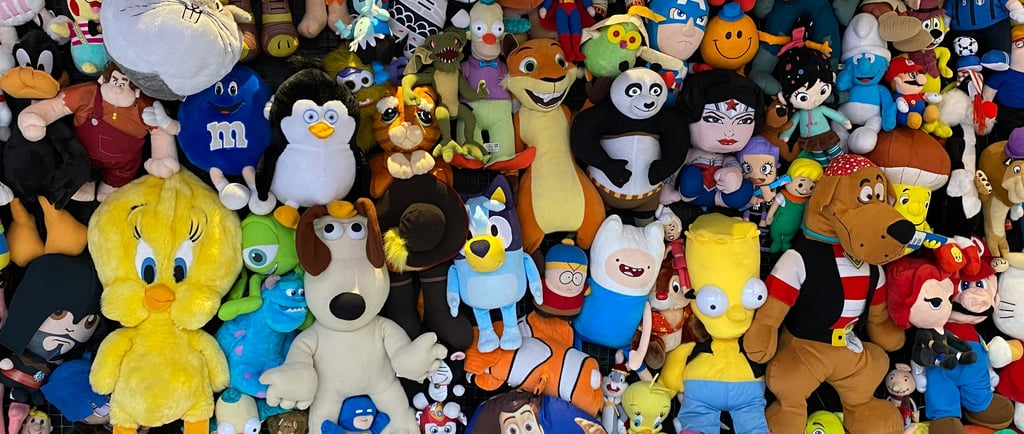 Plush toys neatly ordered next to each other