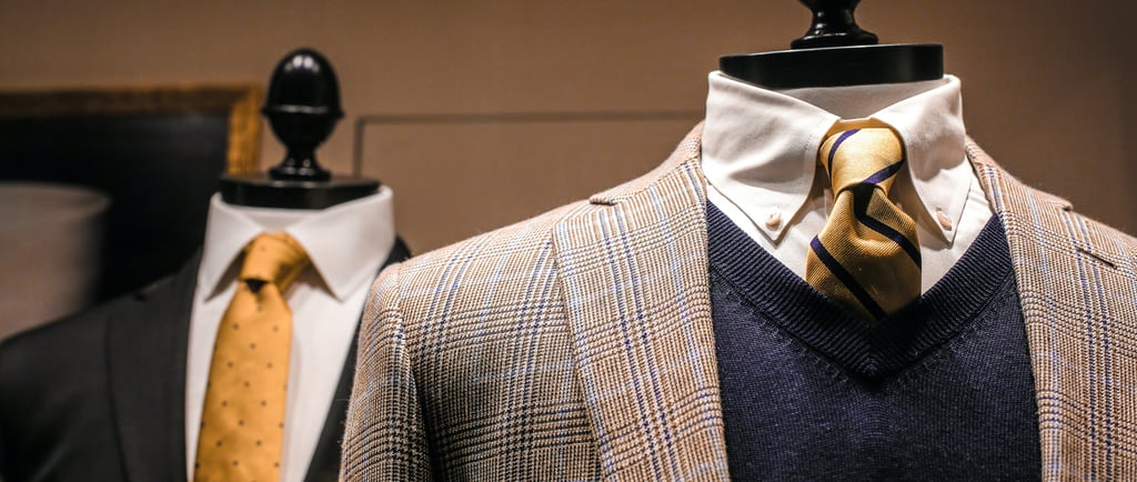 a suit and tie on a mannequine