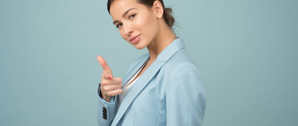 a woman in a blue suit and tie dye