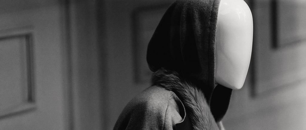 a person wearing a hoodie and a hoodie