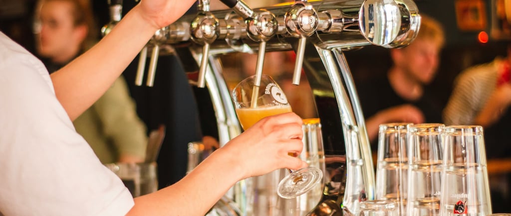 busy restaurant- pouring beer