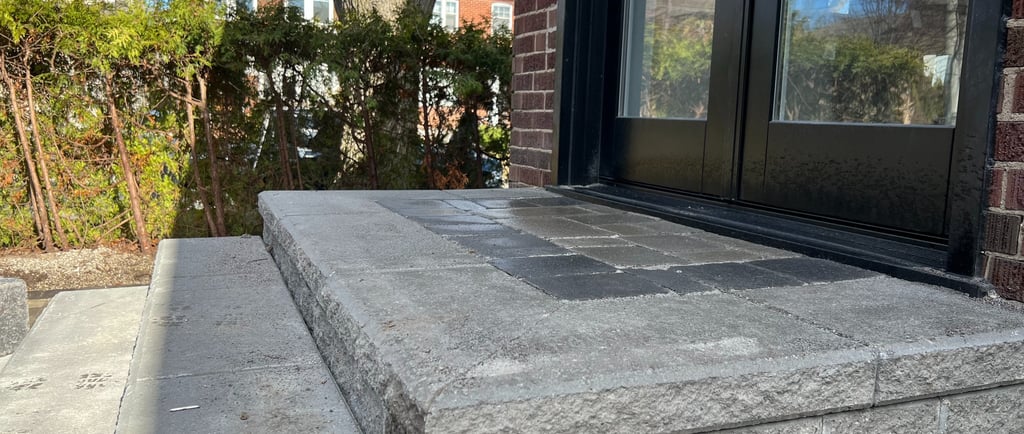 Interlock concrete paver stone steps in backyard