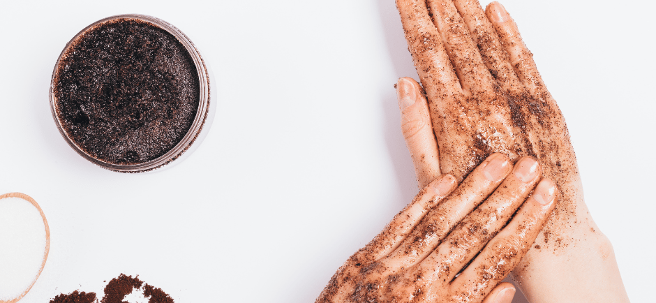 Coffee scrub applied on hands at Kayuh Spa