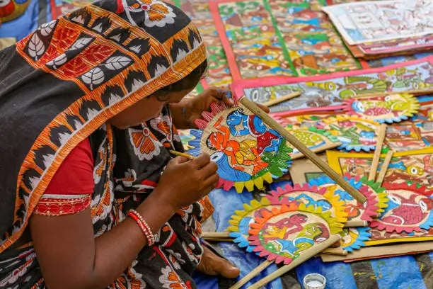Traditional Madhubani painting on mud walls.