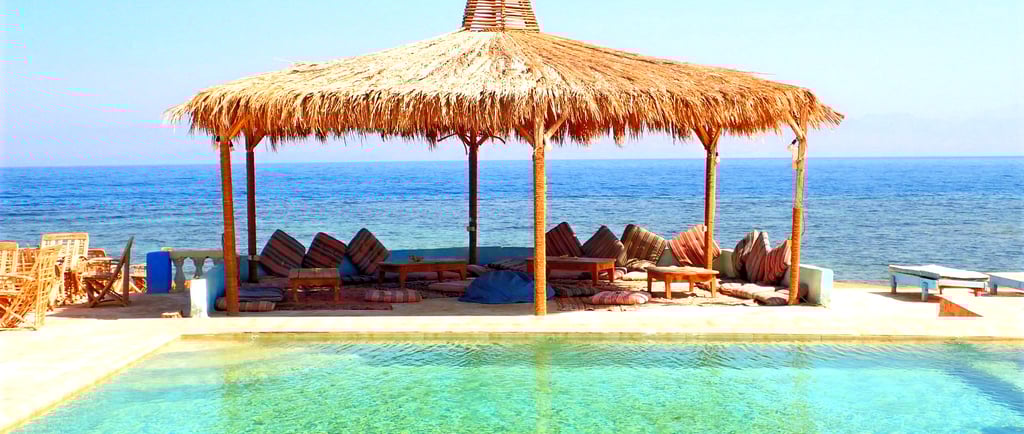Crystal clear water of the sea and pool at Bedouin star
