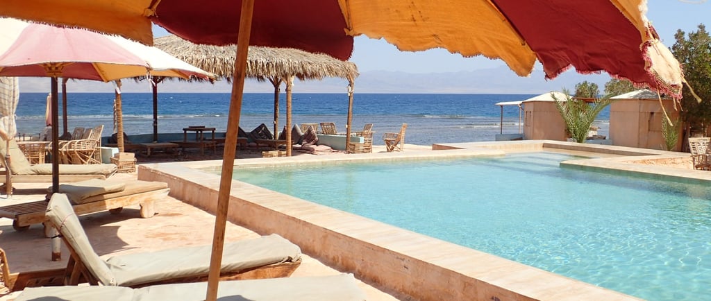 Bedouin star Ras shitan Egypt umbrella pool view